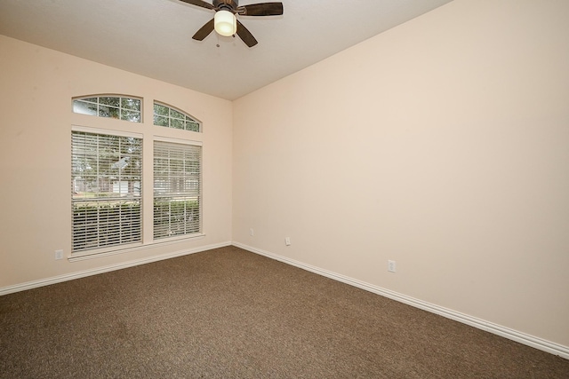 31 Crest Gate, Houston, TX 77082 - unfurnished room featuring ceiling fan, dark carpet, lofted ceiling, and baseboards