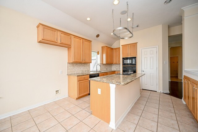 kitchen featuring black appliances, tasteful backsplash, a kitchen island, and light tile patterned flooring