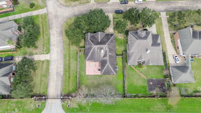 birds eye view of property with a residential view