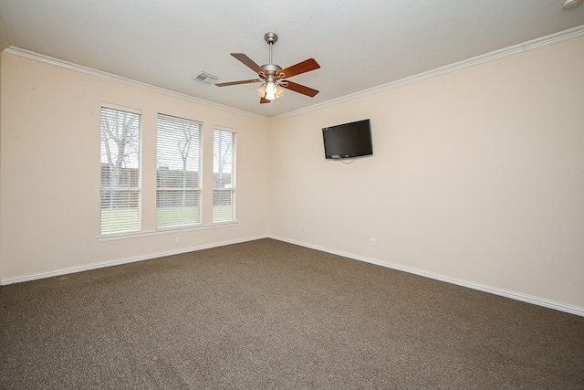 unfurnished room featuring baseboards, visible vents, a ceiling fan, and ornamental molding