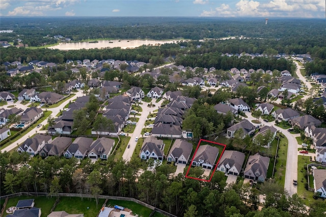 birds eye view of property with a residential view