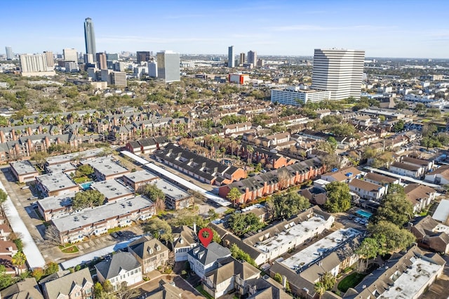 birds eye view of property with a city view