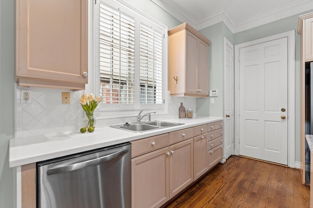 kitchen featuring dark wood-style flooring, crown molding, decorative backsplash, stainless steel dishwasher, and a sink