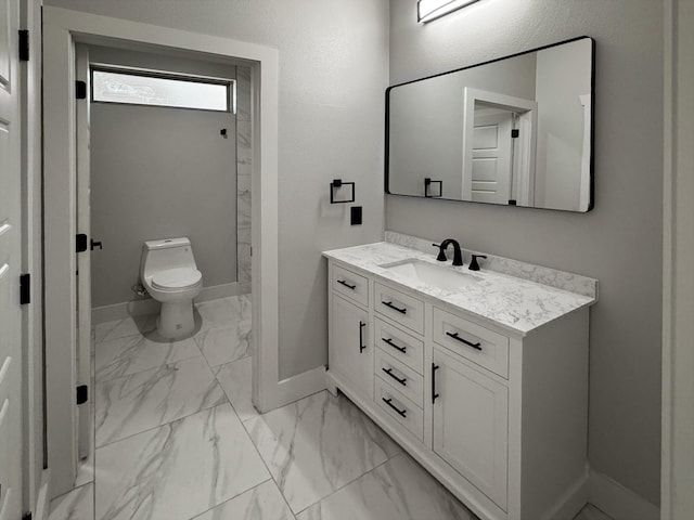 bathroom with marble finish floor, baseboards, vanity, and toilet