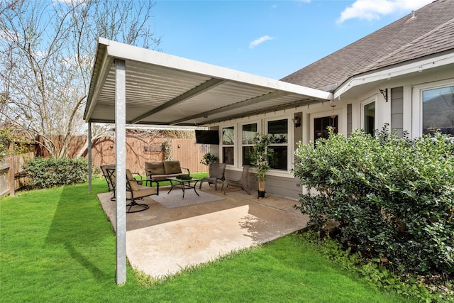 view of patio with an outdoor hangout area and fence