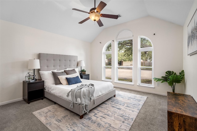 carpeted bedroom featuring lofted ceiling, ceiling fan, and baseboards