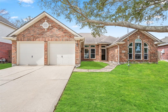 ranch-style house with an attached garage, a front lawn, concrete driveway, and brick siding