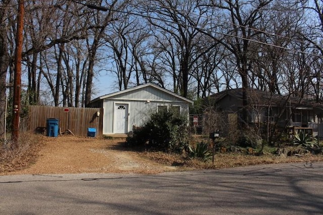 view of front of home with fence