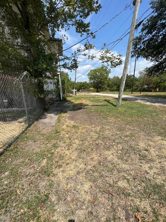 view of yard with fence