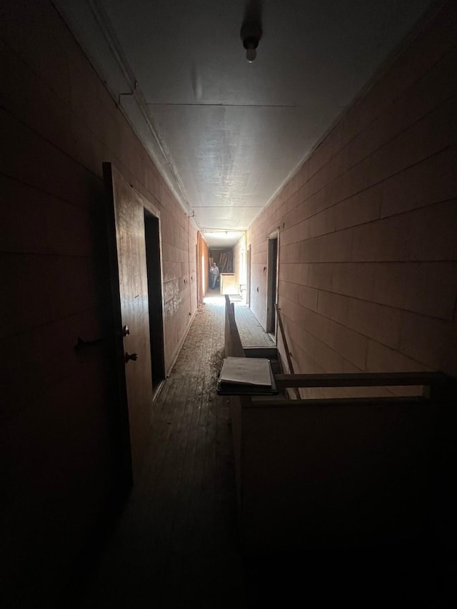 hallway with wood finished floors