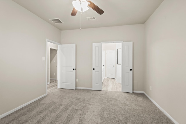 18798 Lucas Michael Way, New Caney, TX 77357 - unfurnished bedroom with carpet floors, baseboards, and a ceiling fan