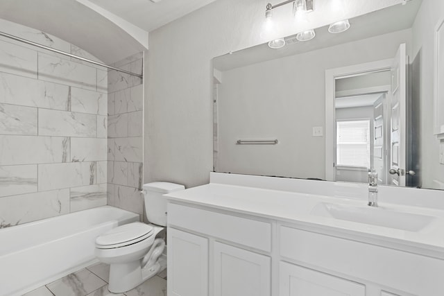 bathroom featuring marble finish floor, bathing tub / shower combination, vanity, and toilet