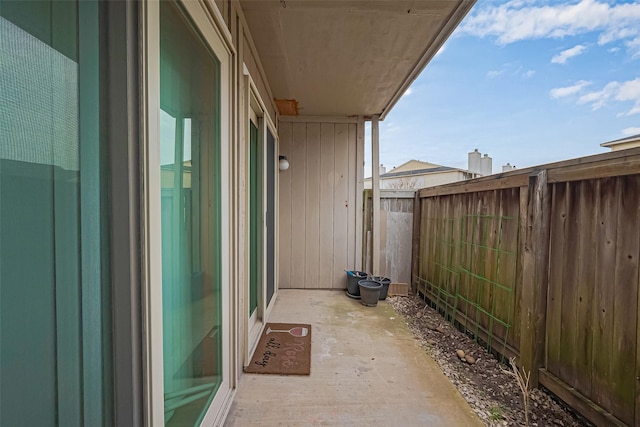 view of patio / terrace featuring fence