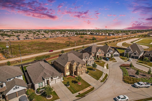 birds eye view of property with a residential view