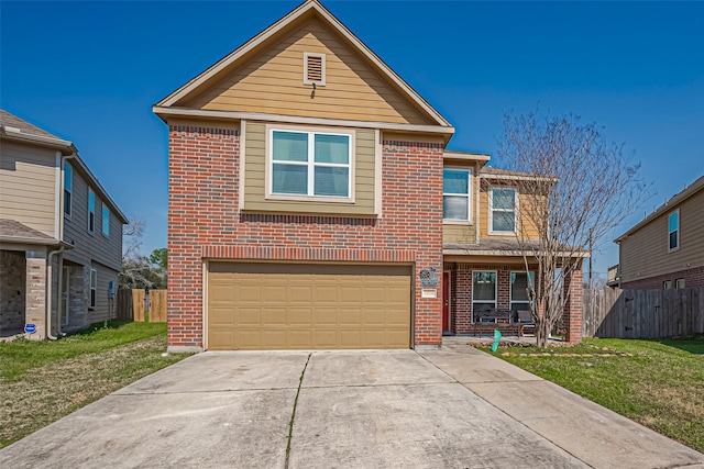 traditional-style home with driveway, a front yard, fence, and brick siding