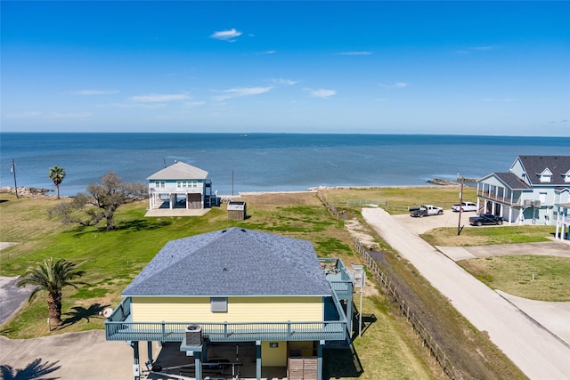 bird's eye view with a water view