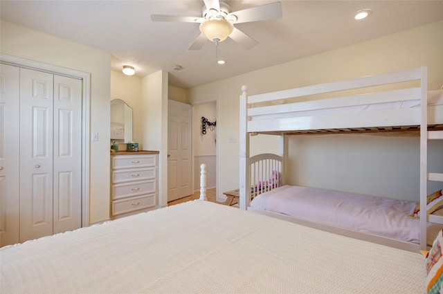 bedroom with a ceiling fan, recessed lighting, and a closet