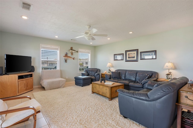 living room with recessed lighting, visible vents, ceiling fan, a textured ceiling, and light tile patterned flooring