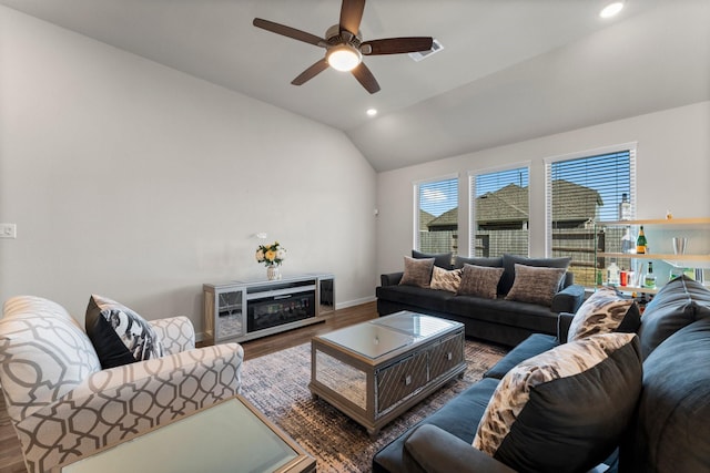 living room with baseboards, vaulted ceiling, wood finished floors, and recessed lighting