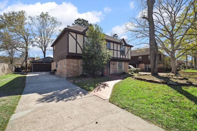 5502 Enchanted Timbers Dr, Humble, TX 77346 - view of front of house with brick siding, a garage, concrete driveway, and stucco siding