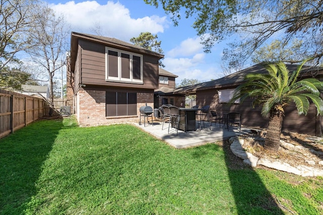 5502 Enchanted Timbers Dr, Humble, TX 77346 - rear view of house with brick siding and a patio
