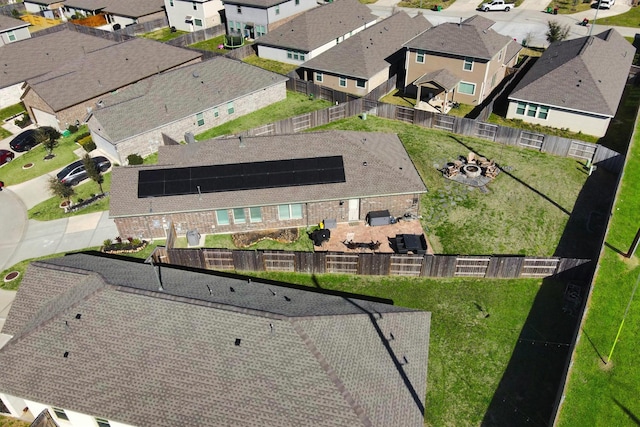 birds eye view of property with a residential view