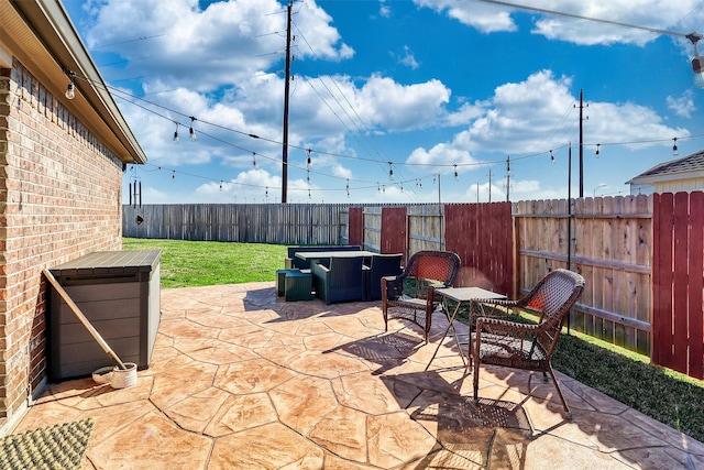 view of patio / terrace featuring a fenced backyard