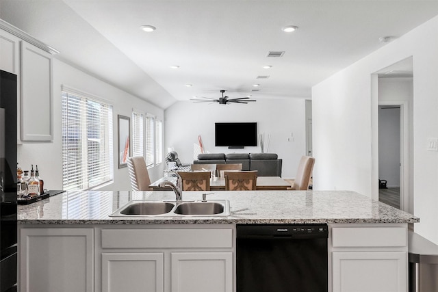 kitchen featuring a ceiling fan, black dishwasher, white cabinetry, and a sink