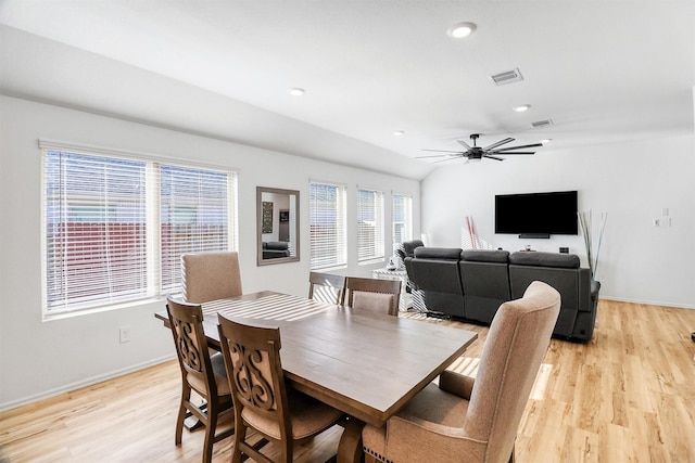 dining space featuring light wood finished floors, baseboards, visible vents, and recessed lighting