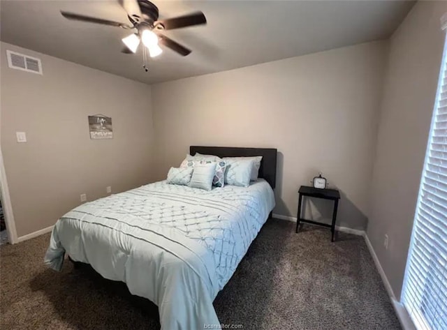 bedroom with ceiling fan, carpet, visible vents, and baseboards