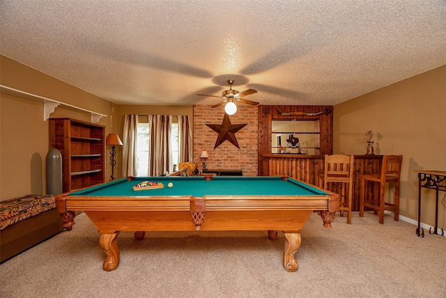 recreation room featuring a textured ceiling, a ceiling fan, carpet flooring, and pool table