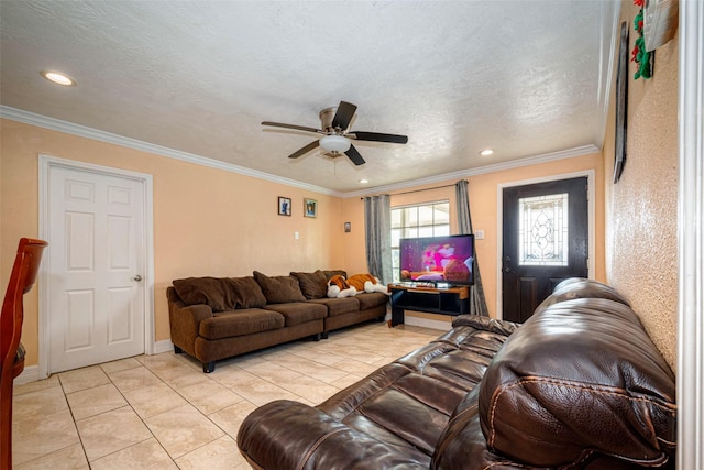 living area with light tile patterned floors, recessed lighting, ornamental molding, a ceiling fan, and a textured ceiling