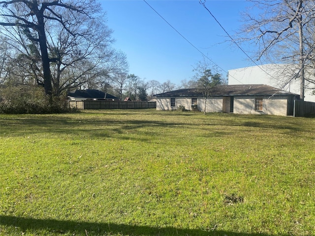 view of yard featuring fence