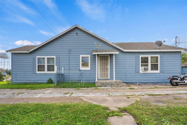 ranch-style house with cooling unit