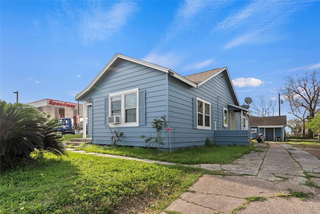 view of side of home featuring cooling unit