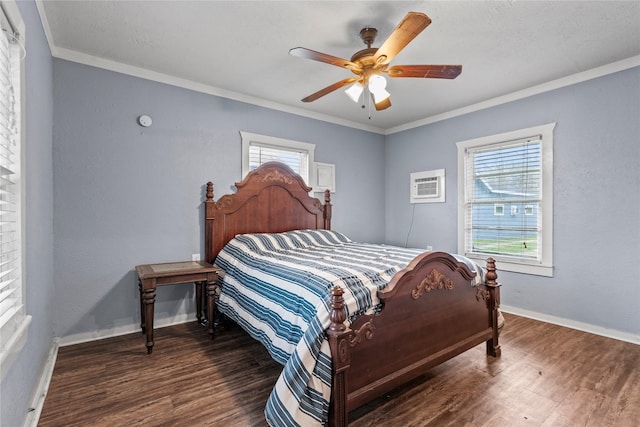 bedroom with baseboards, wood finished floors, crown molding, and a wall mounted AC