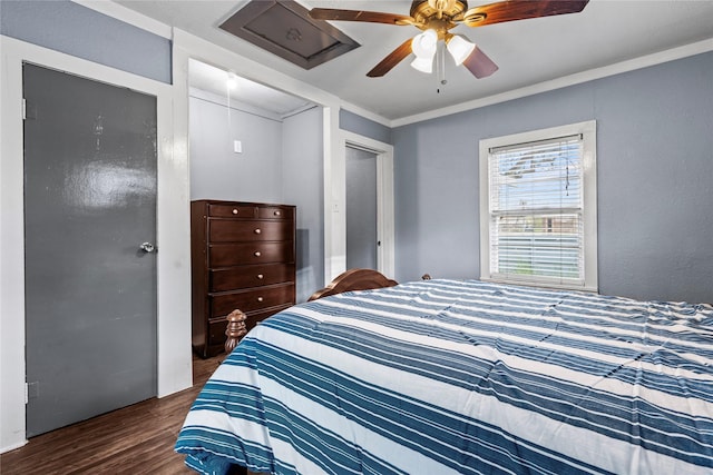 bedroom with ornamental molding, ceiling fan, and wood finished floors