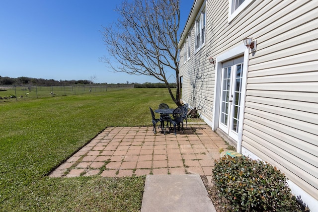 view of patio featuring fence