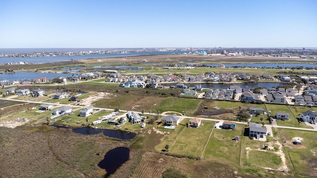 aerial view featuring a water view and a residential view