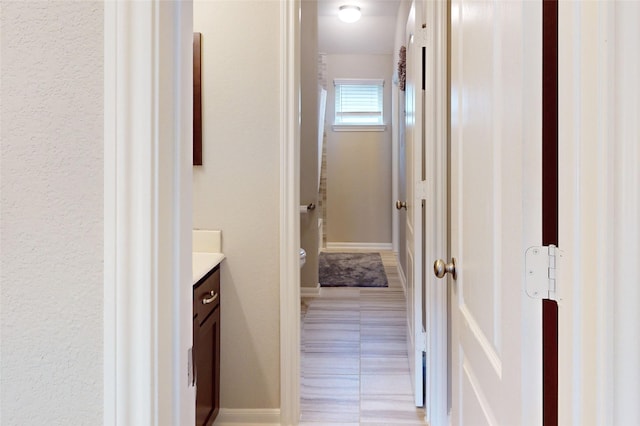 bathroom with toilet and vanity