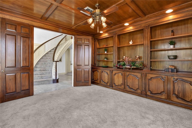 interior space featuring light carpet, built in shelves, wooden ceiling, and coffered ceiling