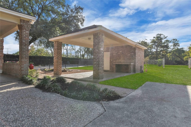 view of patio featuring fence