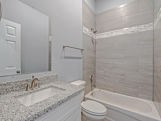 full bathroom featuring shower / bathtub combination, vanity, and toilet