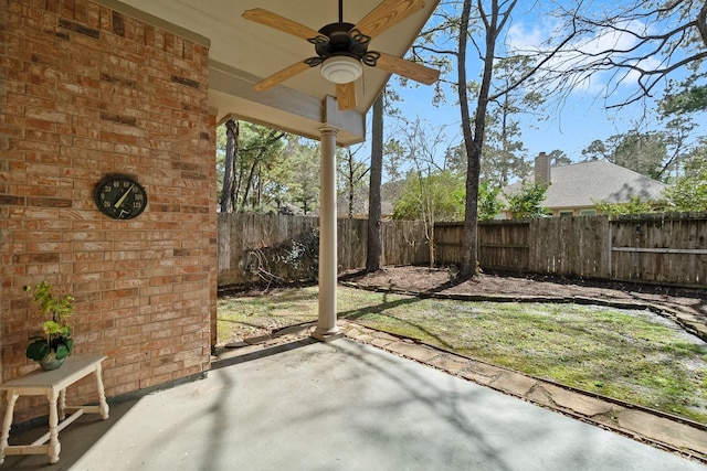 view of patio / terrace with a fenced backyard and ceiling fan