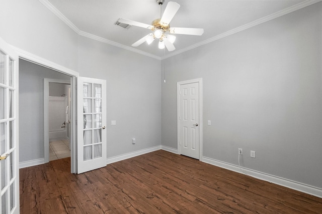 empty room with dark wood-style floors, ceiling fan, crown molding, and french doors