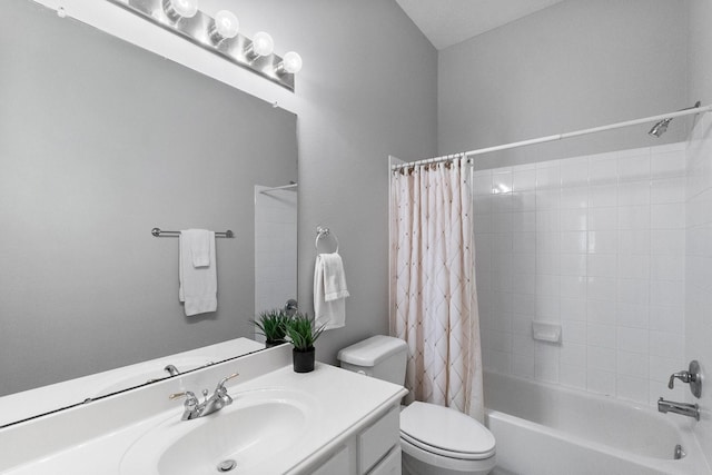 full bath featuring shower / bath combo, vanity, and toilet