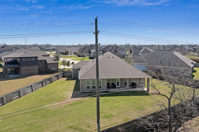 drone / aerial view with a residential view