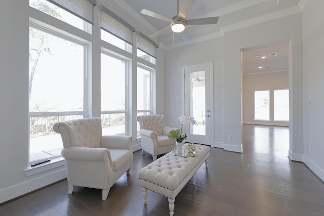 35 Papado Trails Cir, The Woodlands, TX 77375 - living area featuring a ceiling fan, dark wood-style flooring, baseboards, recessed lighting, and ornamental molding