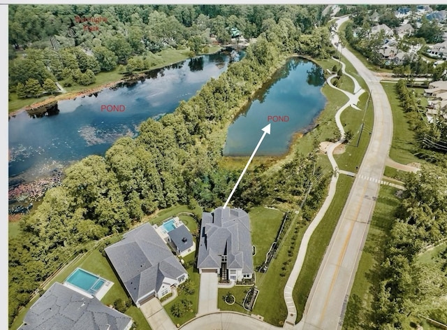 35 Papado Trails Cir, The Woodlands, TX 77375 - aerial view of property and surrounding area featuring a nearby body of water