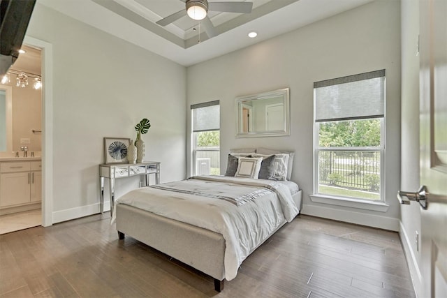 35 Papado Trails Cir, The Woodlands, TX 77375 - bedroom with wood finished floors, ensuite bathroom, baseboards, recessed lighting, and a ceiling fan